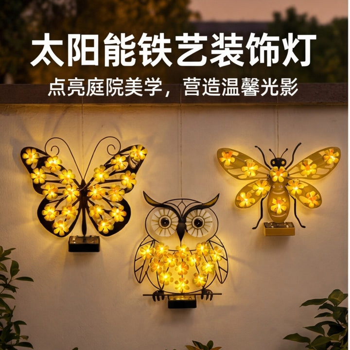 Dekorativ metallbievegglys med integrert fairy LED-lampe og solenergi-modul Skanto