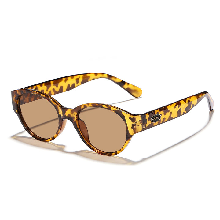 Dame moteriktig solbrille med transparent ramme og ergonomisk design Skanto