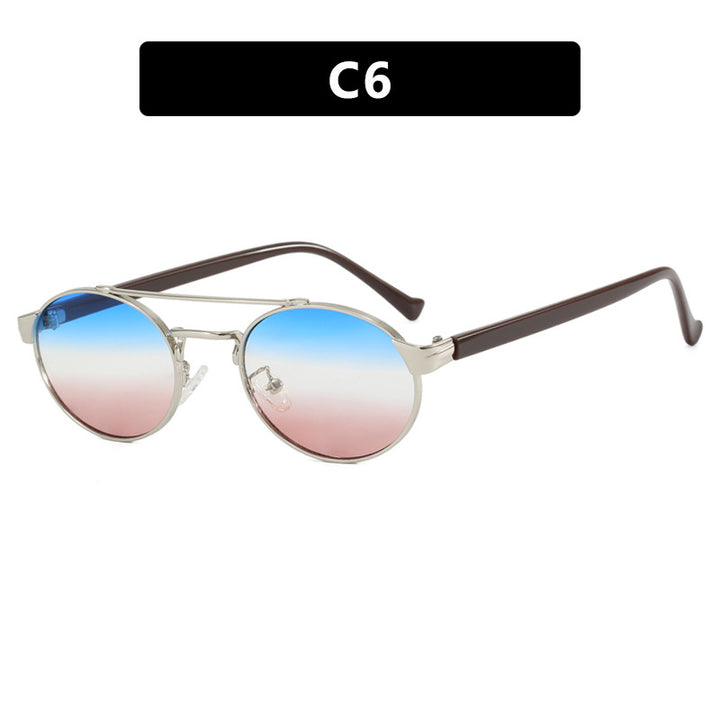 Women's fashionable sunglasses in stylish round design with gold accents Skanto