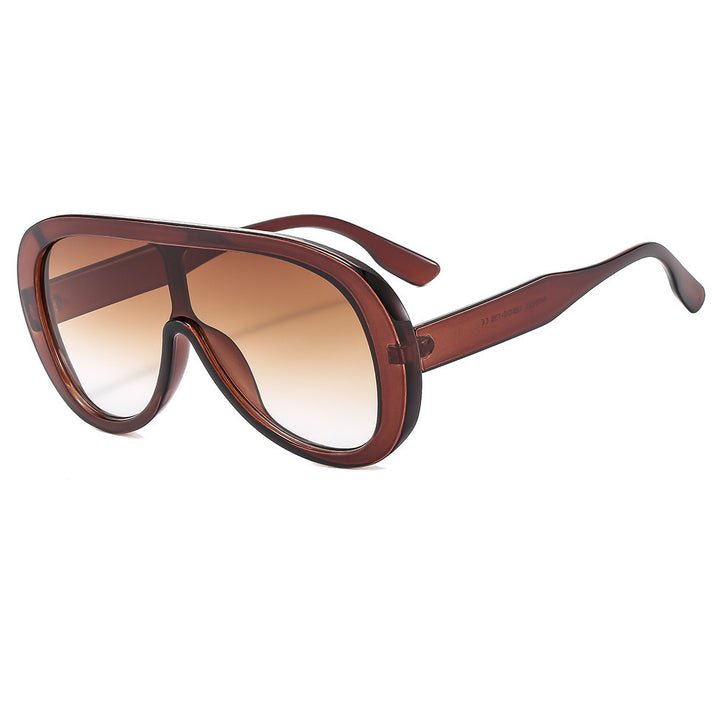 Dame moteriktig solbrille med bred ramme Skanto