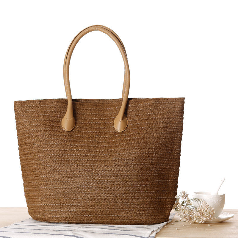 Spacious straw shopper with leather handles Skanto