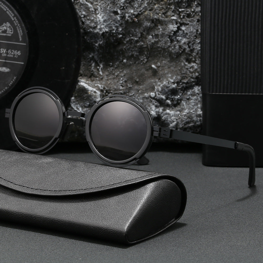 Damer moteriktig rund solbrille med elegant metallramme Skanto