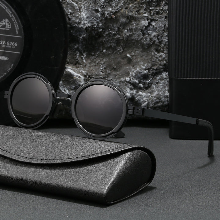 Damer moteriktig rund solbrille med elegant metallramme Skanto