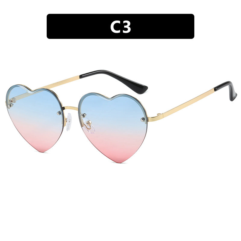 Women's heart-shaped sunglasses with mirrored lenses and modern metal frame Skanto