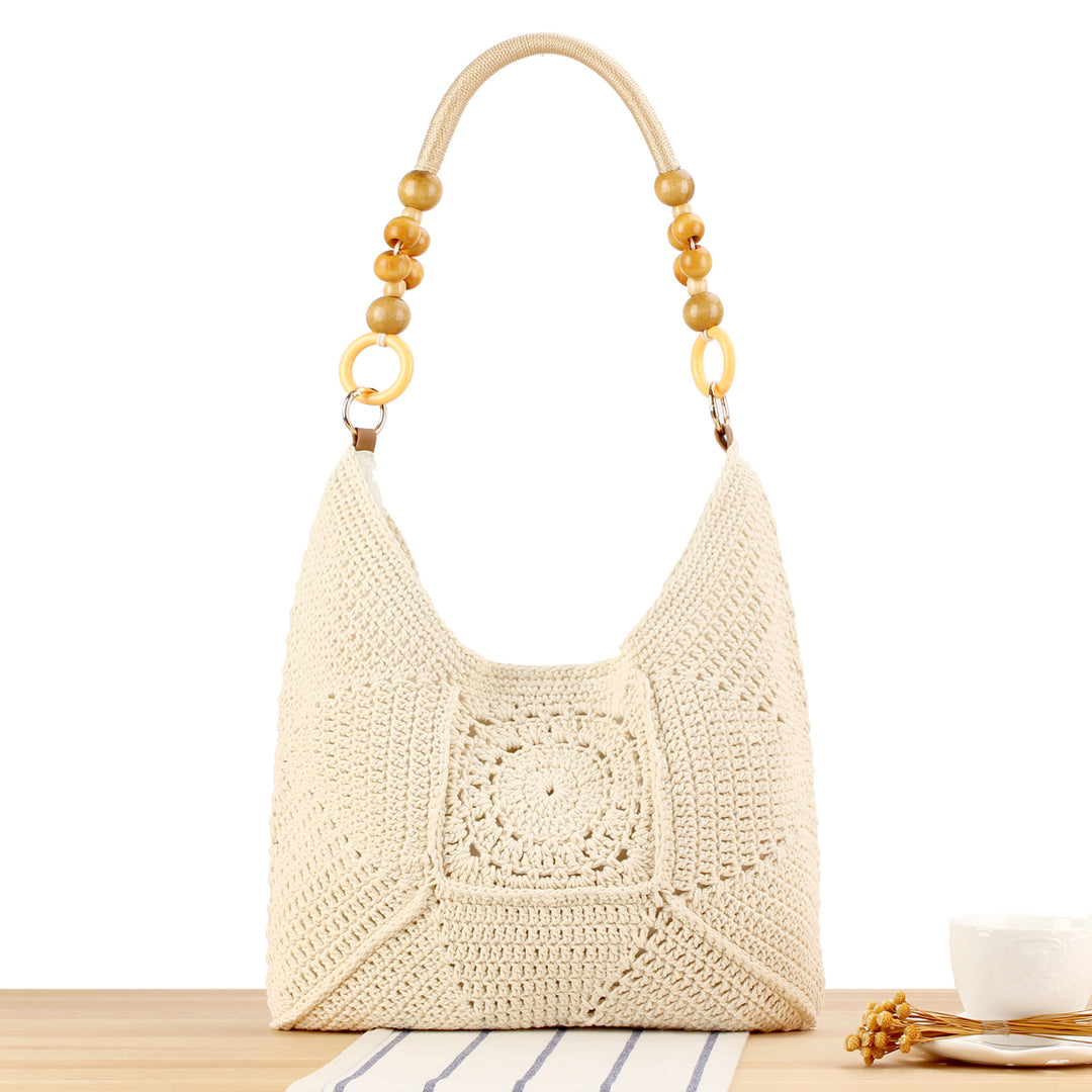 Handbag made of hand-knotted natural material with stylish wooden handles Skanto