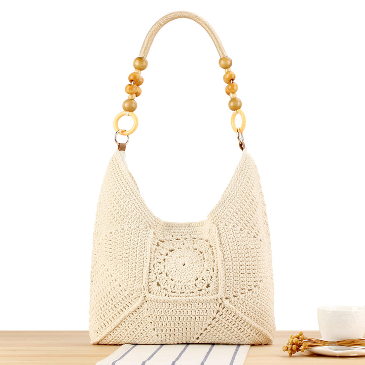 Handbag made of hand-knotted natural material with stylish wooden handles Skanto