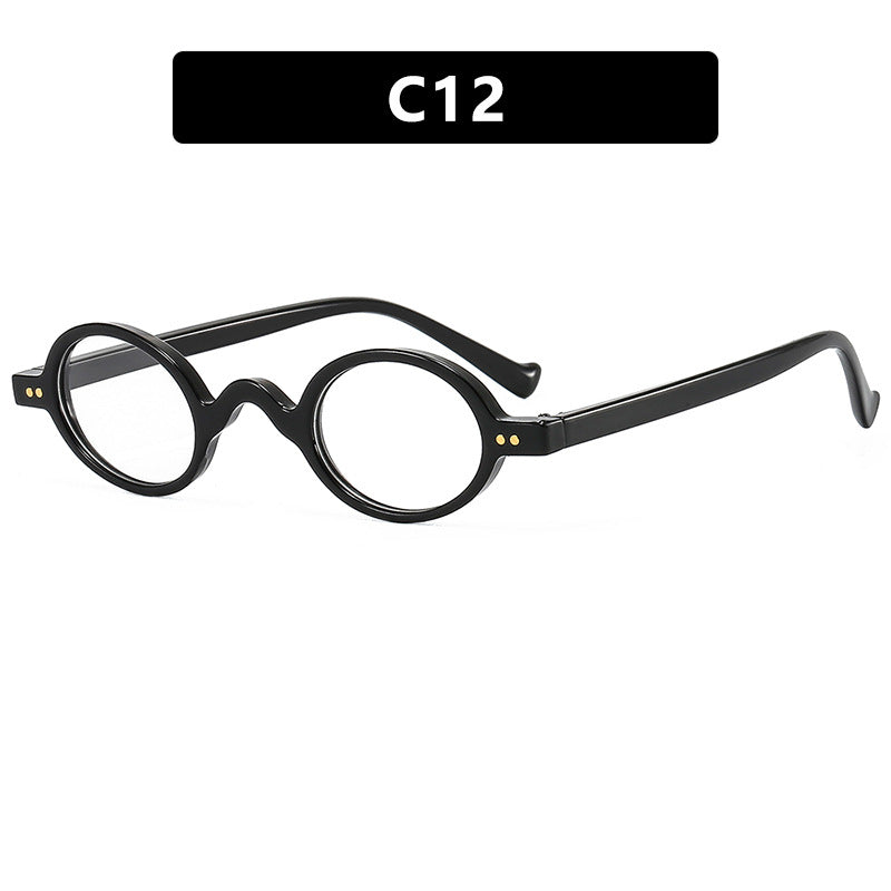 Dame rund solbrille med markant design og høykvalitets plastikkramme Skanto