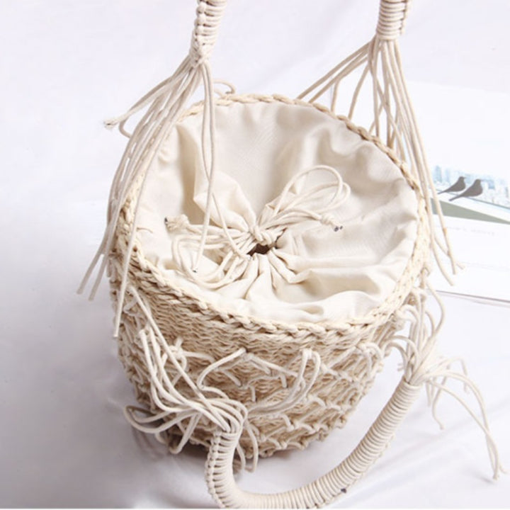 Braided macrame shoulder bag with decorative fringe Skanto