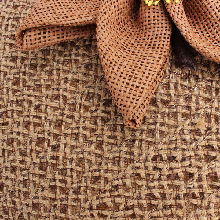 Handbag with floral appliqué in natural material Skanto