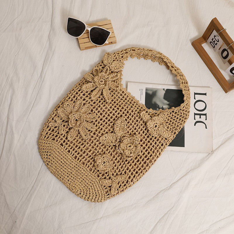 Crocheted shoulder bag with floral appliqués Skanto