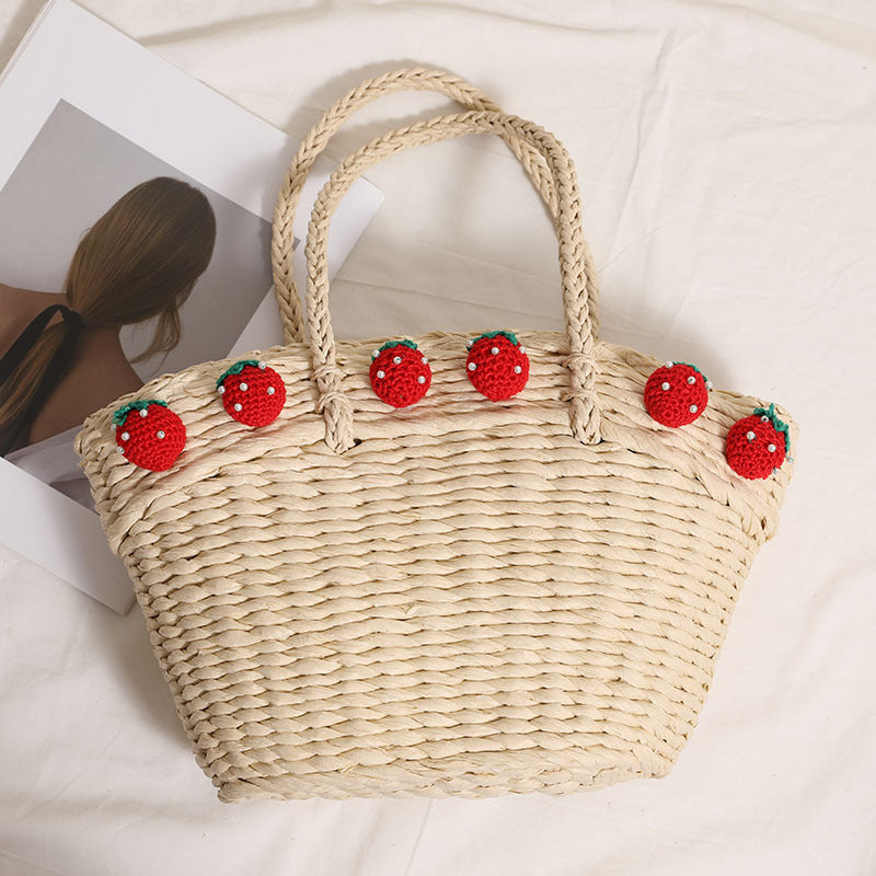 Handmade basket bag with playful strawberry motif Skanto