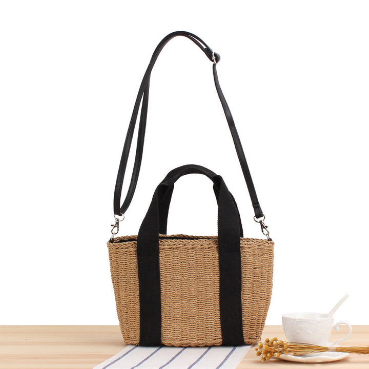 Handbag made of woven natural material with adjustable shoulder strap Skanto