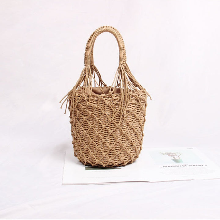 Braided macrame shoulder bag with decorative fringe Skanto