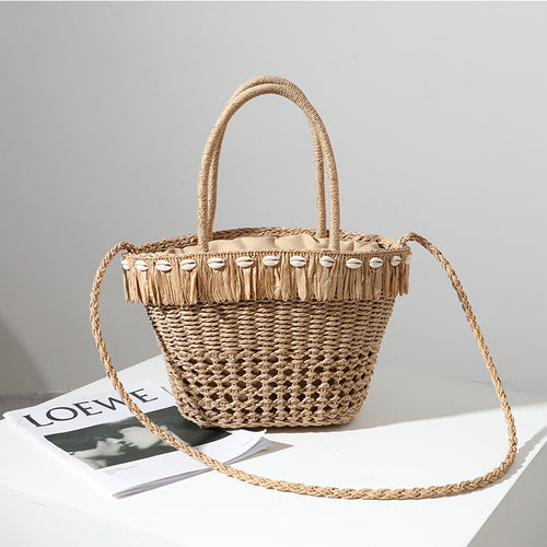 Braided straw bag with decorative tassel detail Skanto