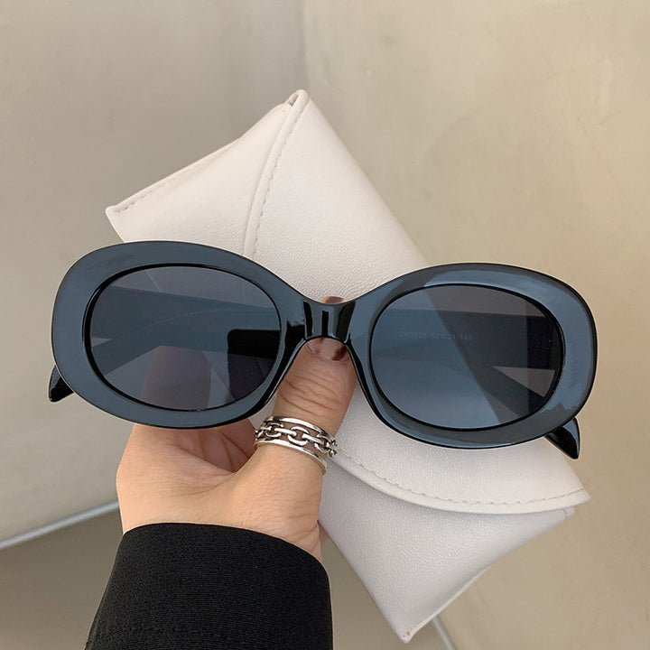 Women's Fashionable Sunglasses in Elegant Oval Design with Robust Frame Skanto