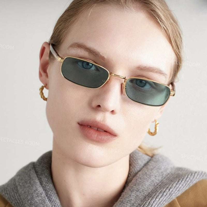 Women's fashionable sunglasses with stylish metal frame and orange lenses Skanto