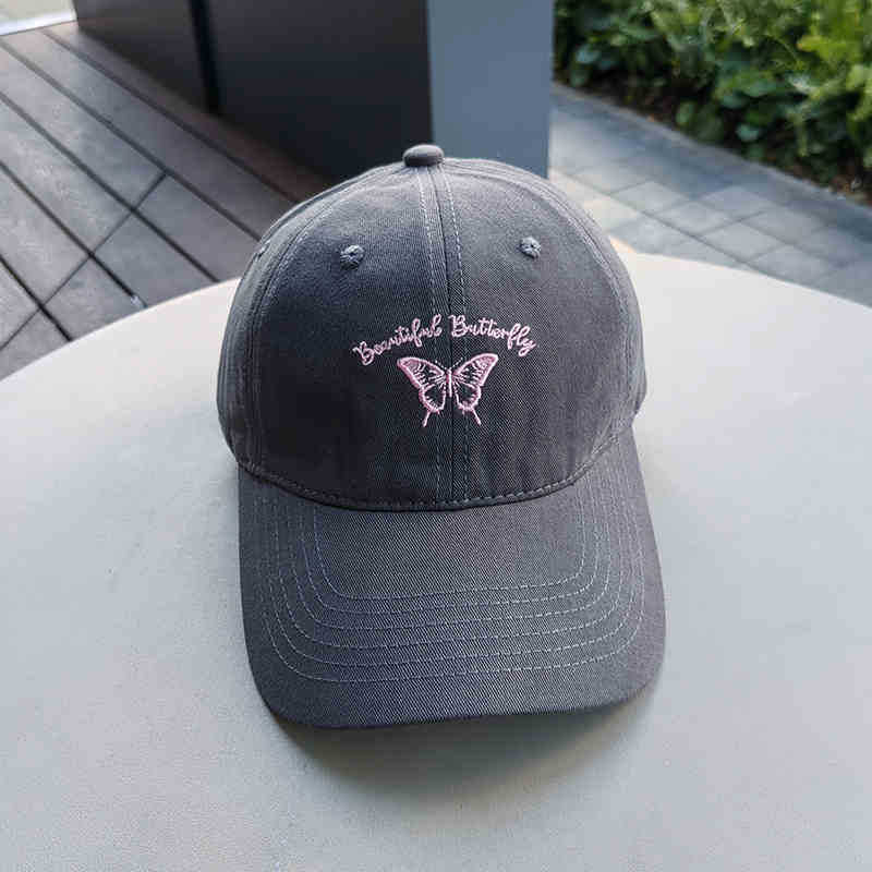 Kvinnens broderte sommerfugl caps Skanto