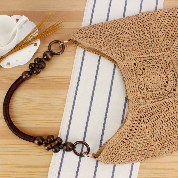 Handbag made of hand-knotted natural material with stylish wooden handles Skanto