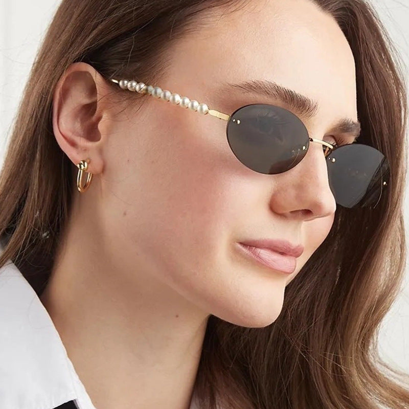 Women's stylish oval sunglasses with elegant decorations Skanto