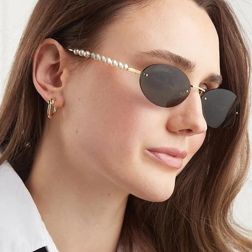 Women's stylish oval sunglasses with elegant decorations Skanto