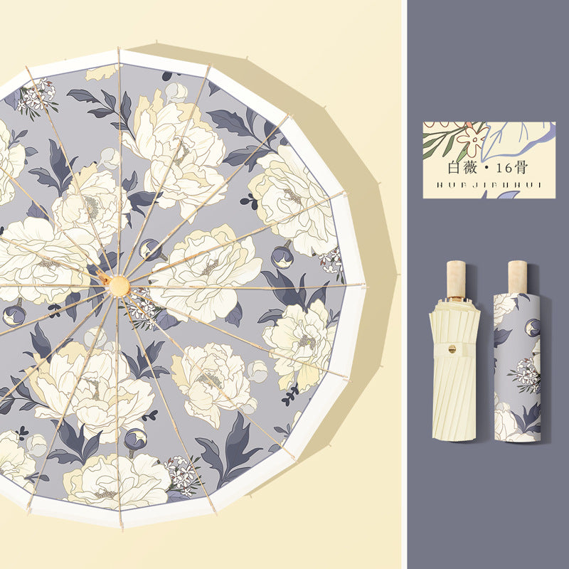 Dame elegant designer-paraply med blomsterdesign Skanto