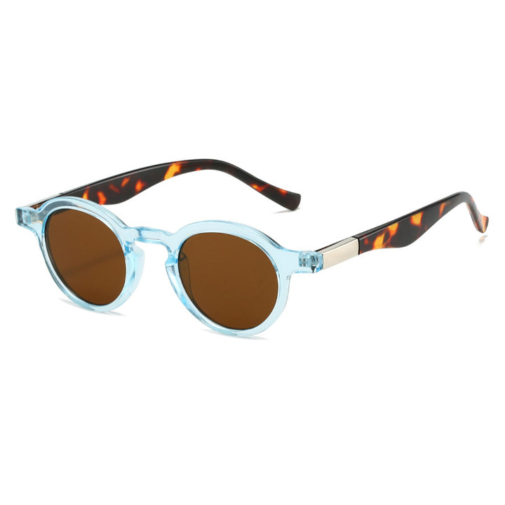 Dame eksklusiv solbrille i elegant skilpadde-design Skanto