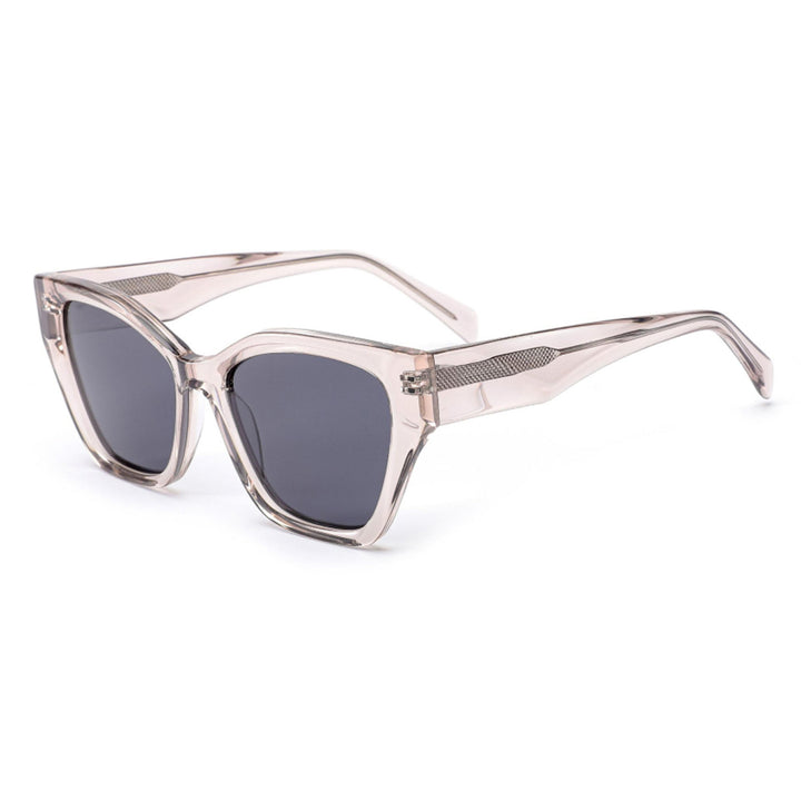 Dame solbrille med moderne ramme og lekne detaljer Skanto