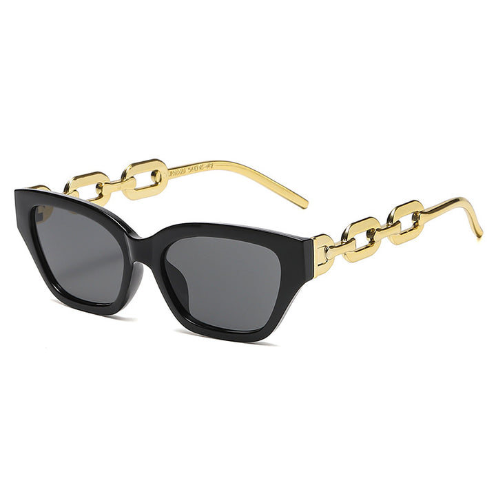Dame Cat-Eye solbrille med dekorativ kjettingramme Skanto
