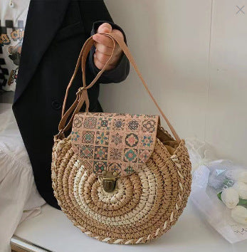 Round straw bag with adjustable leather strap Skanto