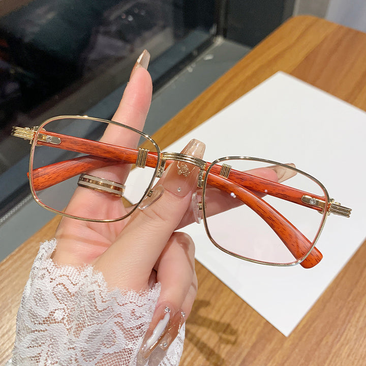 Dame solbrille med luksuriøs treinnfatning Skanto