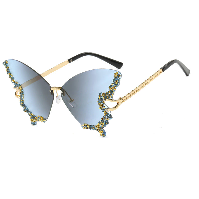 Women's large cat-eye sunglasses with sparkling rhinestone decoration and elegant frame Skanto
