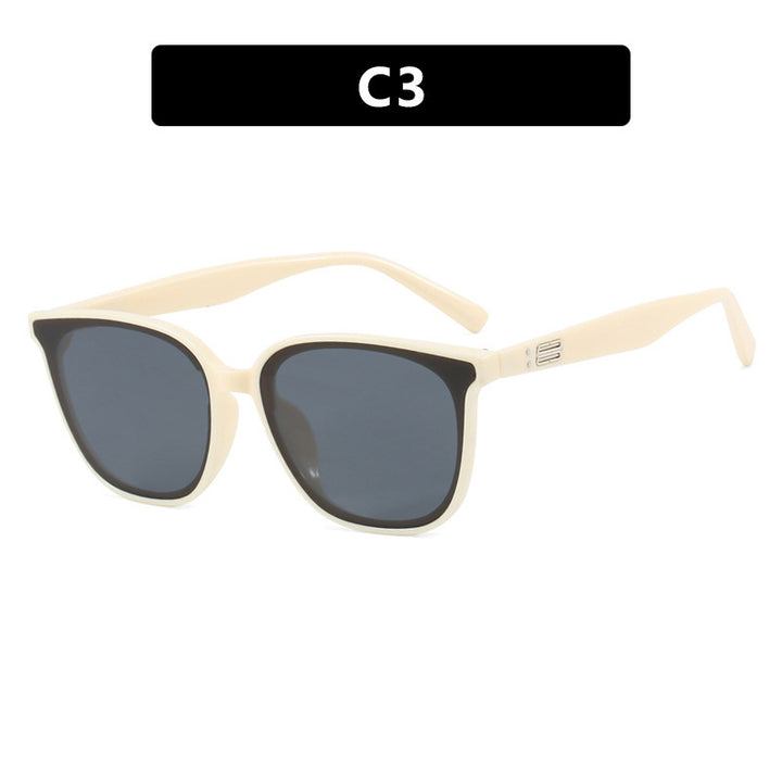 Dame elegant solbrille med trendy gjennomsiktig ramme Skanto