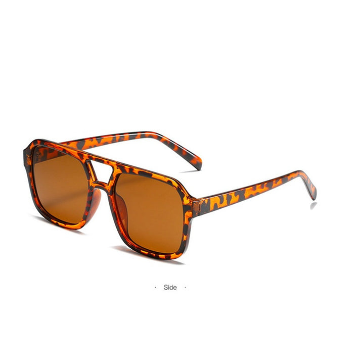 Dame modische Oversized-solbrille med iøynefallende mønster Skanto