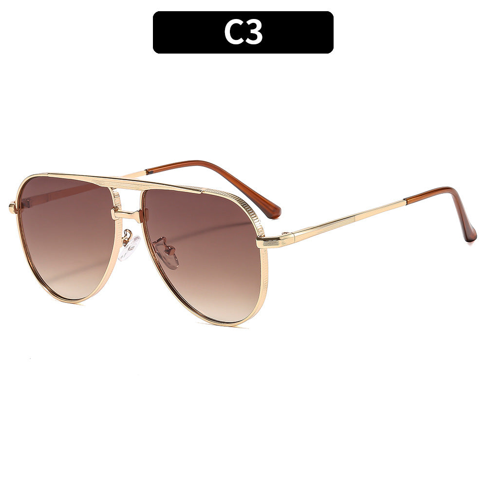 Dame modische Aviator-solbrille med elegant metallramme og UV400-beskyttelse Skanto