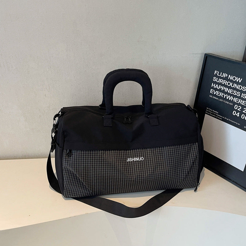Sporty fritids-duffelbag med ergonomiske håndtak og flere rom Skanto