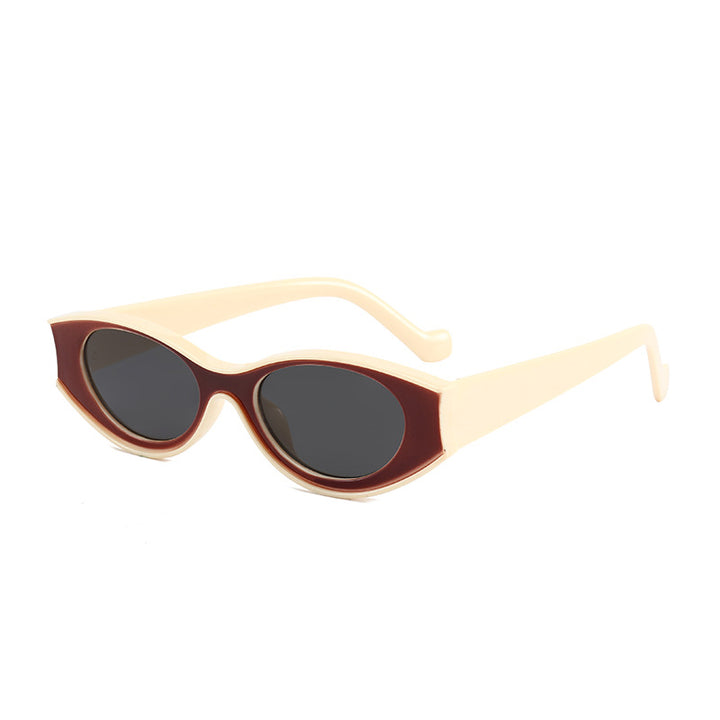 Damer Cat-Eye solbriller med kontrasterende rammedesign Skanto