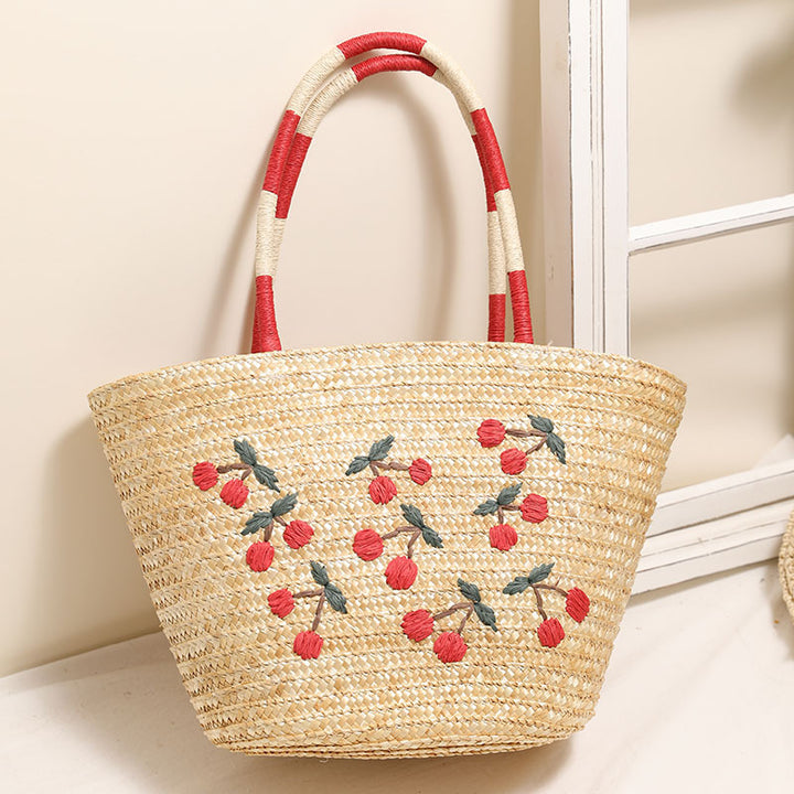 Handmade basket bag with vibrant floral embroidery design Skanto