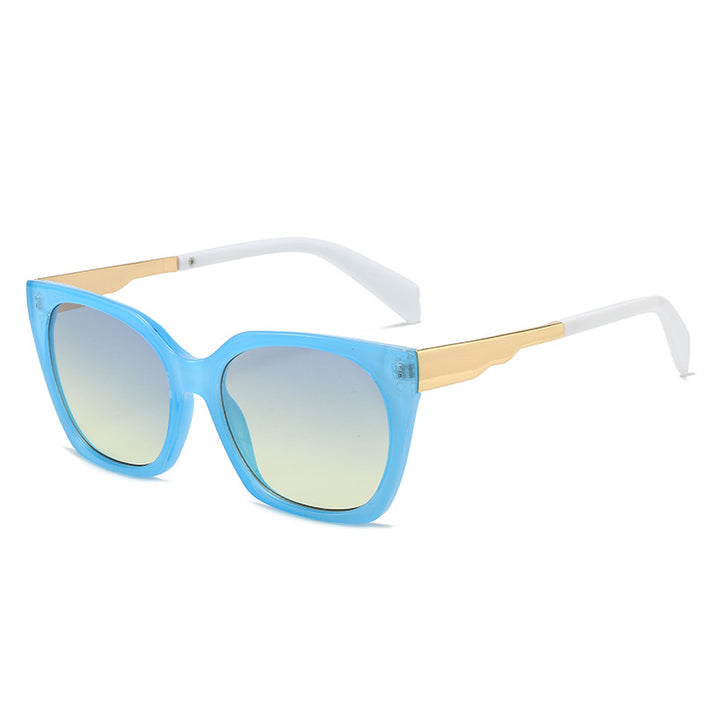 Dame Oversized-solbriller med elegant transparent ramme og gyldne aksenter Skanto