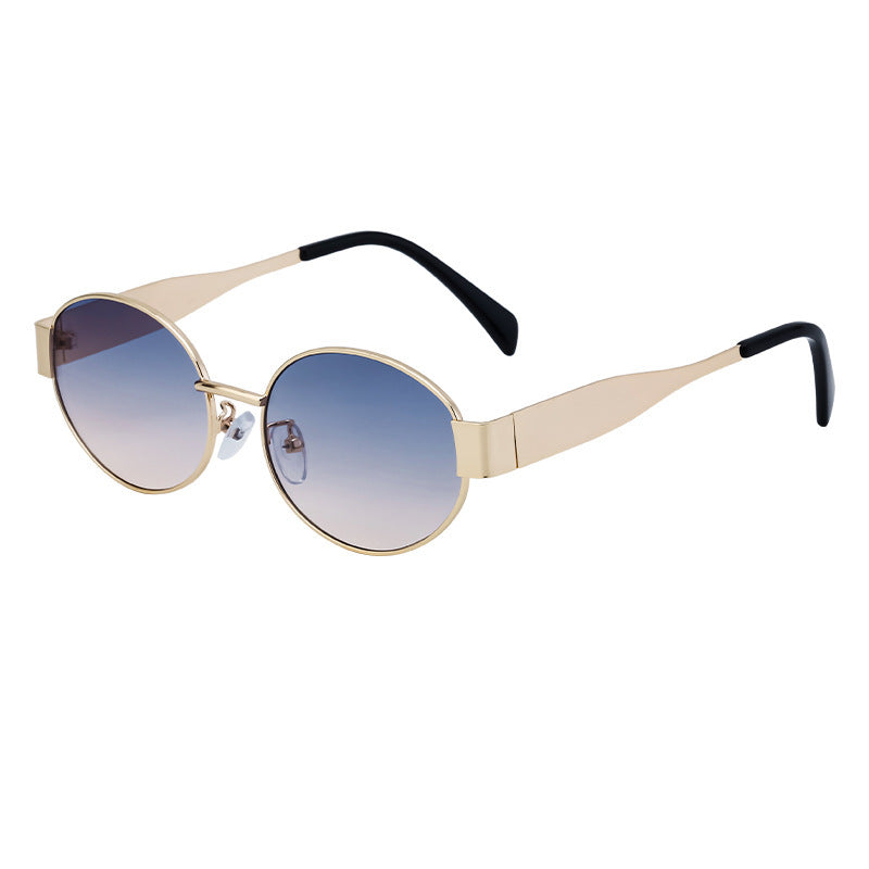 Dame moteriktig solbrille i elegant oval design Skanto