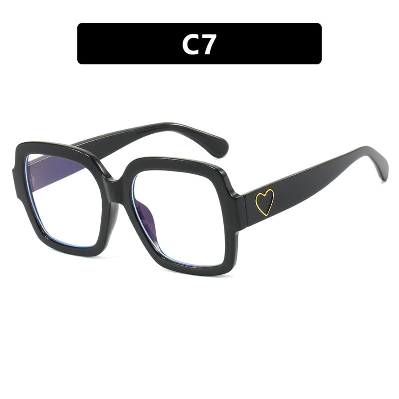 Dame firkantet solbrille med leken hjerte detalj Skanto