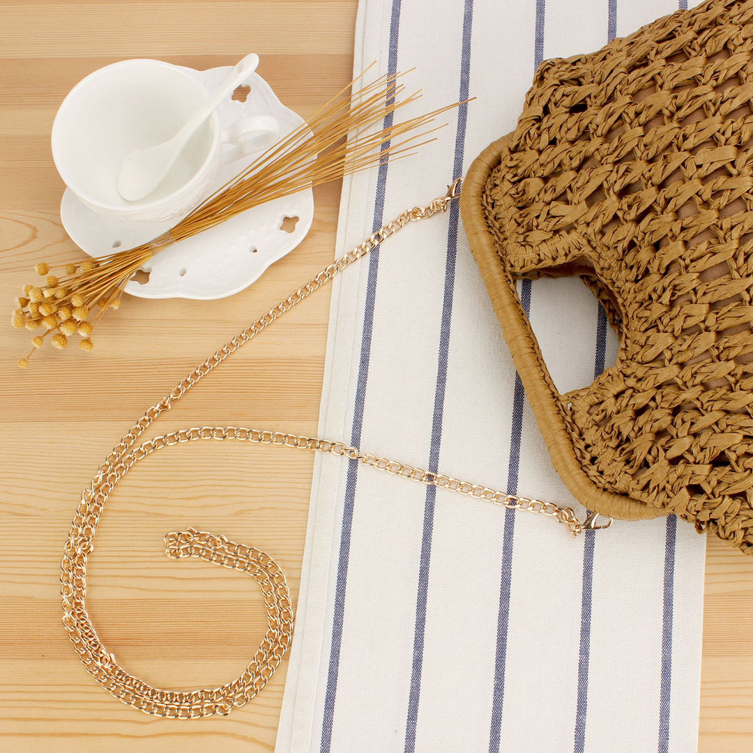 Beach shoulder bag made of natural weave with elegant chain decoration Skanto