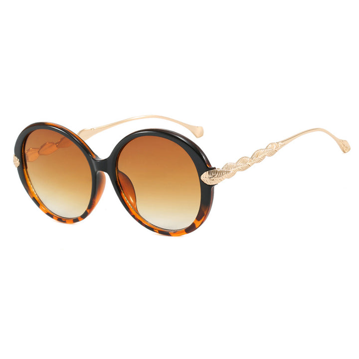 Women's large round sunglasses with decorative metal accents Skanto
