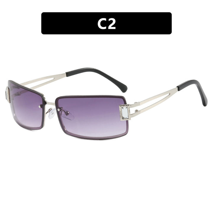 Stylish women's sunglasses with elegant trapezoidal lenses and filigree metal frame Skanto