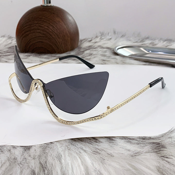 Women's extravagant shaped Cat-Eye sunglasses with sparkling applications Skanto