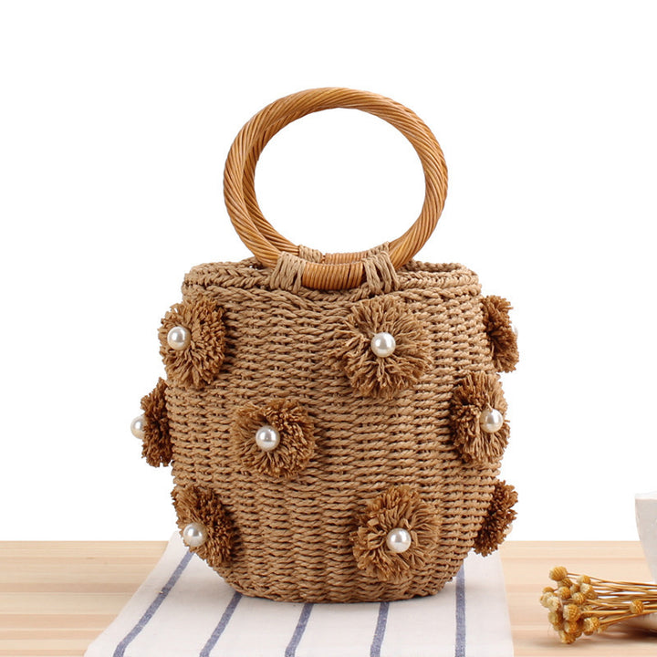 Handbag with unique pearl embellishments Skanto