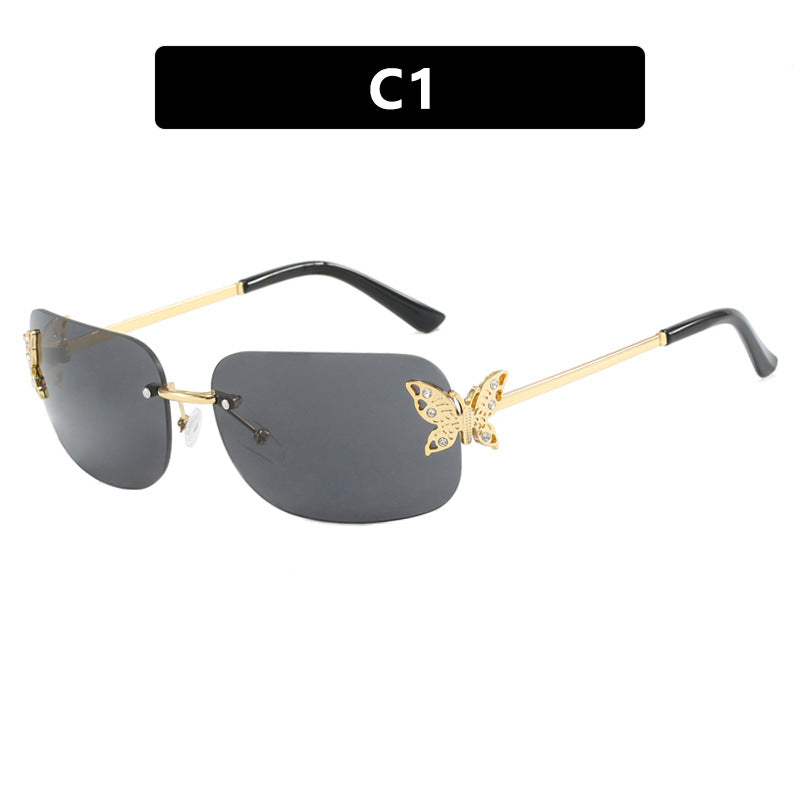 Women's fashionable sunglasses with filigree butterfly design and protective lenses Skanto