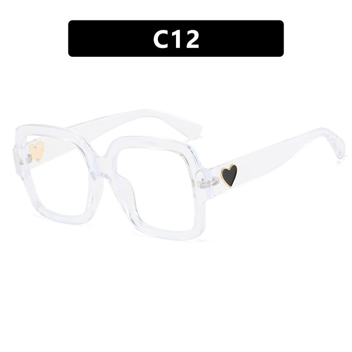 Dame firkantet solbrille med leken hjerte detalj Skanto