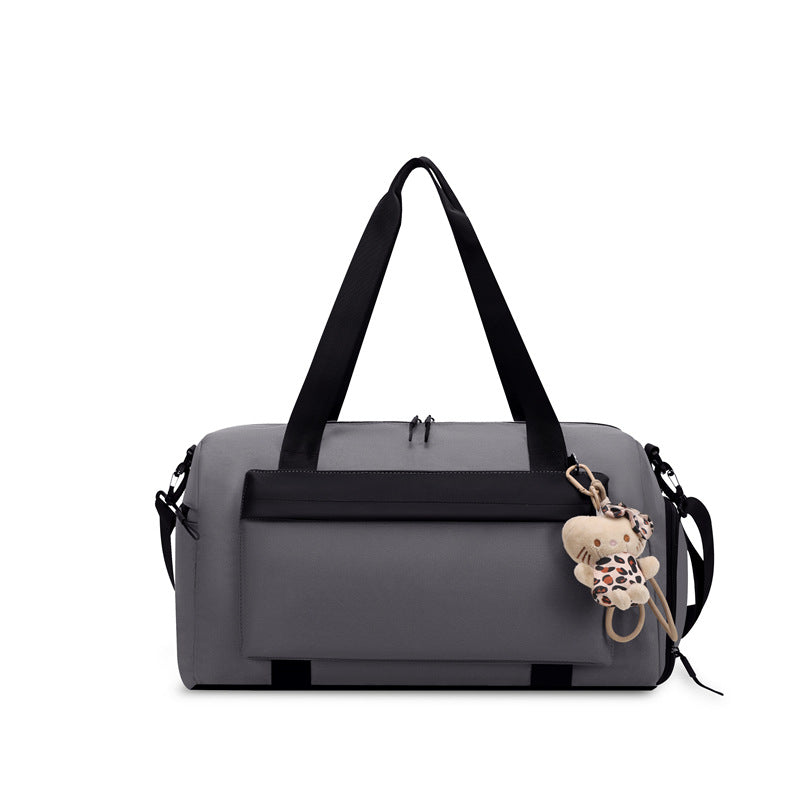 Sporty duffel bag with practical compartments and detachable shoulder strap Skanto