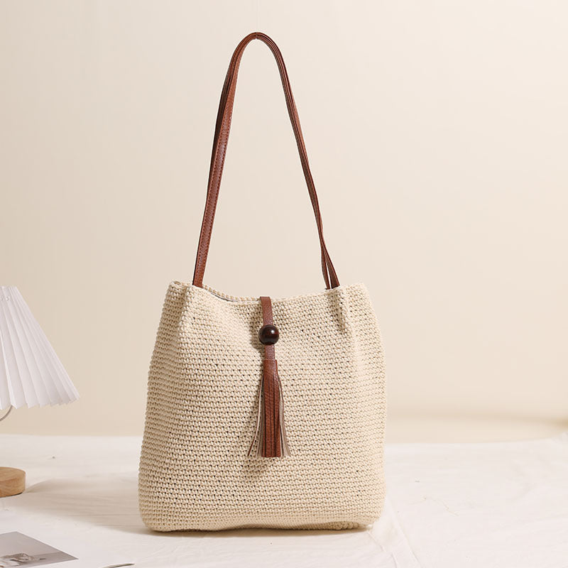 Hand-crocheted crossover bag with leather details Skanto