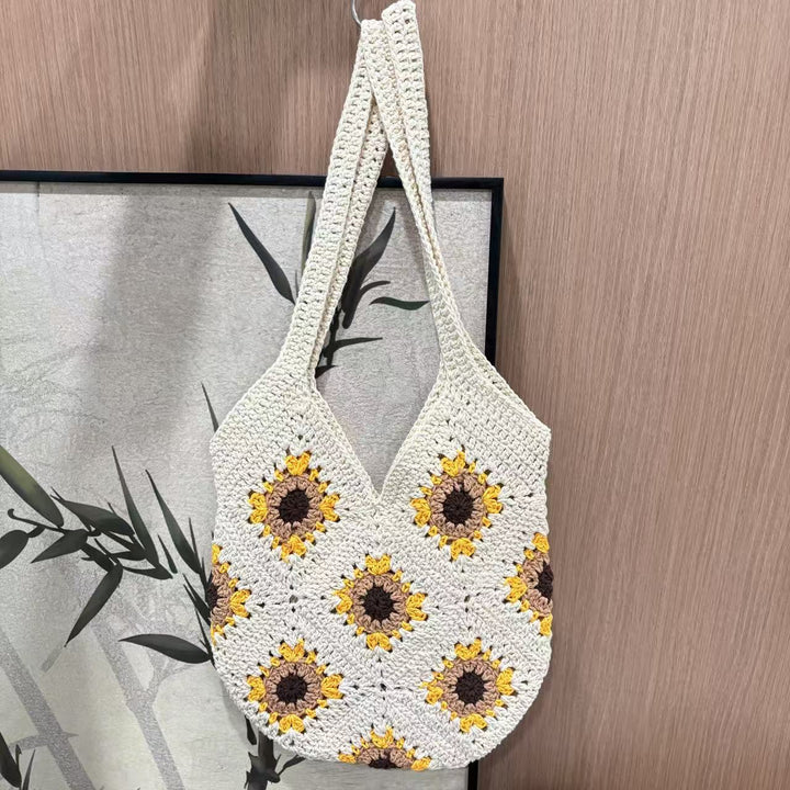 Håndlaget makraméveske med solblomstmotiv Skanto